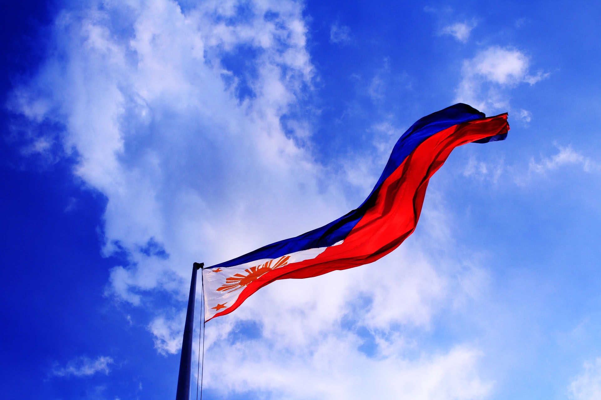 Filipino Flag Waving in the Air